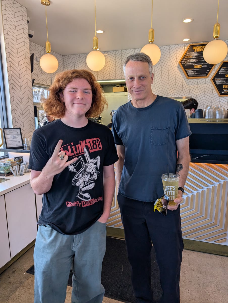 Liam Reid with Tony Hawk